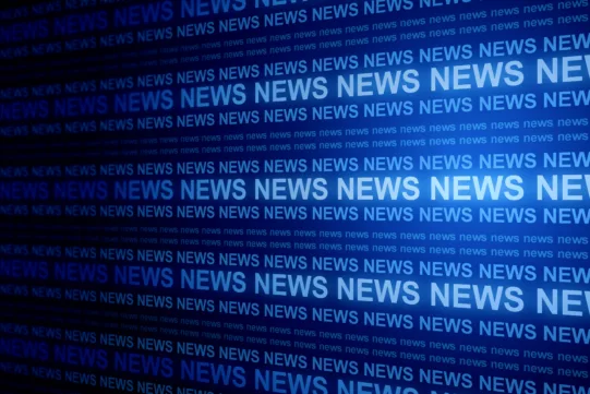 Blue background with the word “NEWS” repeated multiple times in various shades of blue, creating a news-themed visual pattern.
